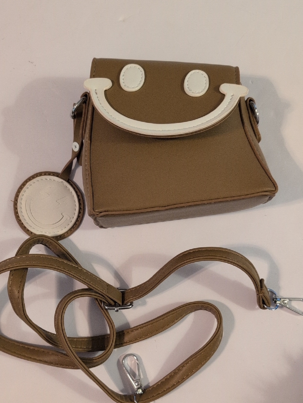 Brown Crossbody Bag with White Smile Accent
